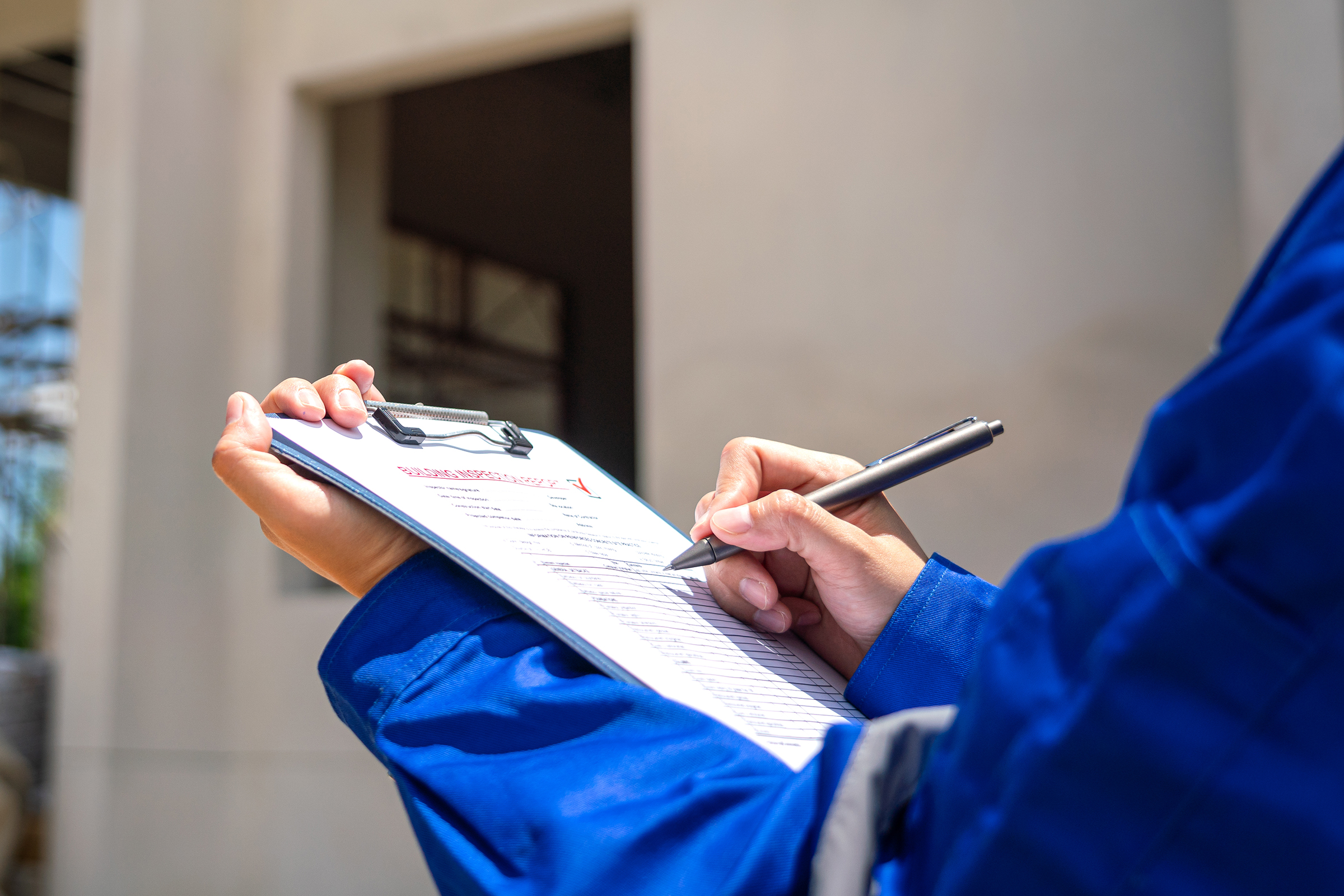 An Architect Is Checking On House Building Quality Checklist For